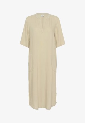Ljusbeige linnekjol med korta ärmar, V-ringning, två sidofickor och sprund på sidorna för ökad rörelsefrihet. Slät textur och avslappnad passform.