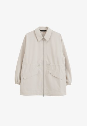 Veste beige clair à manches longues avec fermeture éclair frontale, col pointu, poignets élastiques, cordons de taille réglables et deux poches à rabat à l'avant.