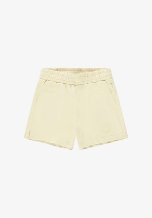 Lichtbeige shorts gemaakt van zachte stof, met een elastische tailleband, twee zijzakken en een reliëf logo detail aan de voorkant.