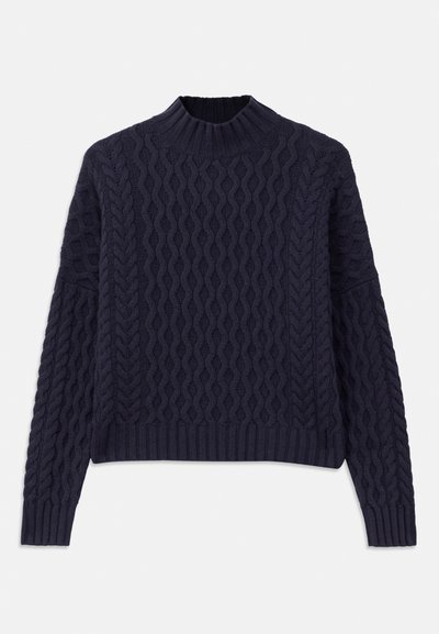 Navy blue knitted sweater featuring a textured wave pattern, high neckline, and ribbed cuffs and hem for a structured fit.