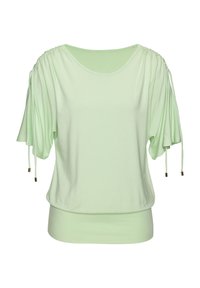 Helles grünes kurzärmliges Oberteil mit gerüschtem Stoffdetails an den Schultern. Verfügt über Kordelzüge mit goldenen Akzenten und einen lockeren Schnitt. Weiches Material.