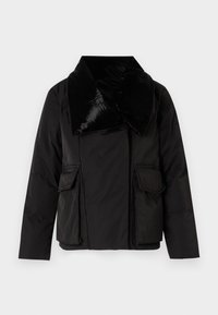 Black padded jacket with a wide satin collar, featuring two front pockets and a smooth texture. Minimalist design, buttonless closure.