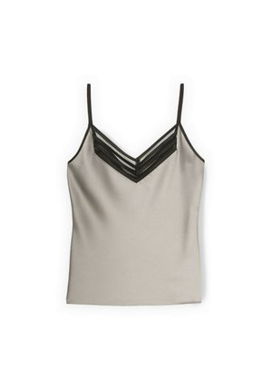 Beige ärmellose Camisole mit dünnen schwarzen Trägern und einem schwarzen, V-förmigen gestreiften Mesh-Detail am Ausschnitt.