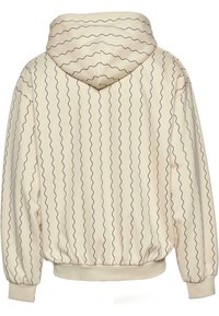 Beige hoodie med långa ärmar, elastiska ärmaverk och svarta vågiga vertikala ränder på ryggen och huvan.