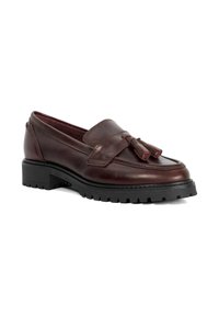 Brown leather loafer with tassel accents, featuring a thick black rubber sole and a smooth finish. Sleek design with rounded toe.