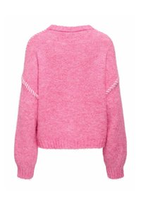 Roze pluche trui met een ronde halslijn, verlaagde schouders, geribbelde zoom en contrasterende stiksels langs de mouwen.