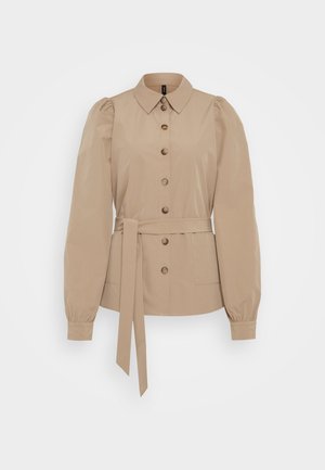 Beige button-up shirt with a collar, long puff sleeves, a tied waist, and two front pockets, made of smooth cotton fabric.