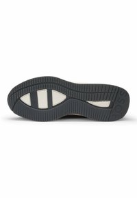 Rubber sneaker sole with a textured black finish, featuring a white accent and distinct tread pattern for traction. Lettering "BOSS" embossed.
