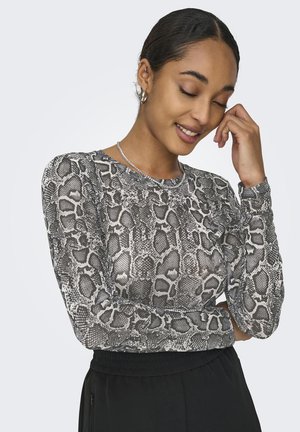 T-shirt à manches longues avec un motif serpent en noir et gris, col rond et silhouette ajustée. Fabriqué dans un matériau texturé et extensible.