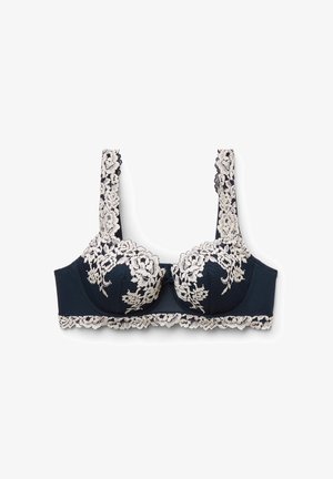 Mørkeblå bh med hvide blomsterblonde detaljer på skåle, stropper og nederste kant, med bøjle og lille sløjfe i midten.