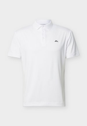 Hvit kortermet polo med en tre-knappers slagknapp og liten svart logo på venstre bryst.