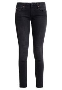 Pantalones vaqueros negros ajustados hechos de denim, con un diseño clásico de cinco bolsillos, herrajes en tono cobre y silueta entallada. Textura suave.