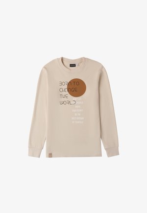 Camiseta de manga larga beige hecha de algodón suave, con un gráfico circular marrón y texto motivacional impreso en negro y blanco.