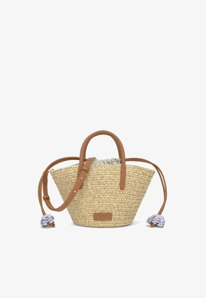 Woven straw handbag with brown leather handles, adjustable shoulder strap, and fabric drawstring closure with decorative end knots.