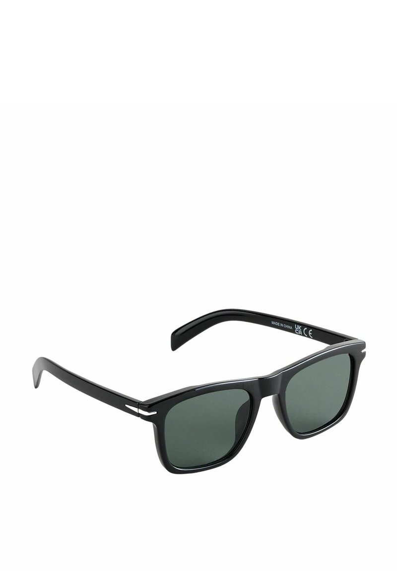 Mustad mustad päikeseprillid tumeroheliste läätsedega. Kaunis plastraam, millel on hõbedased aktsendid templeitel. Klassikaline disain.