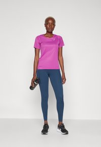 Nike Performance UNIVERSA - Leggingek - armory navy/black