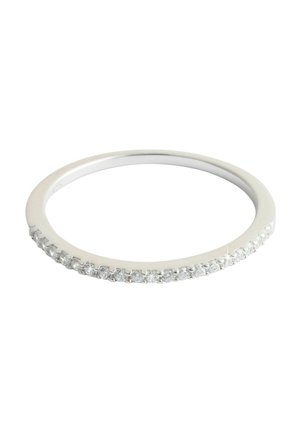 Thin silver ring with a row of small round clear stones set along the outer band, sparkling softly.