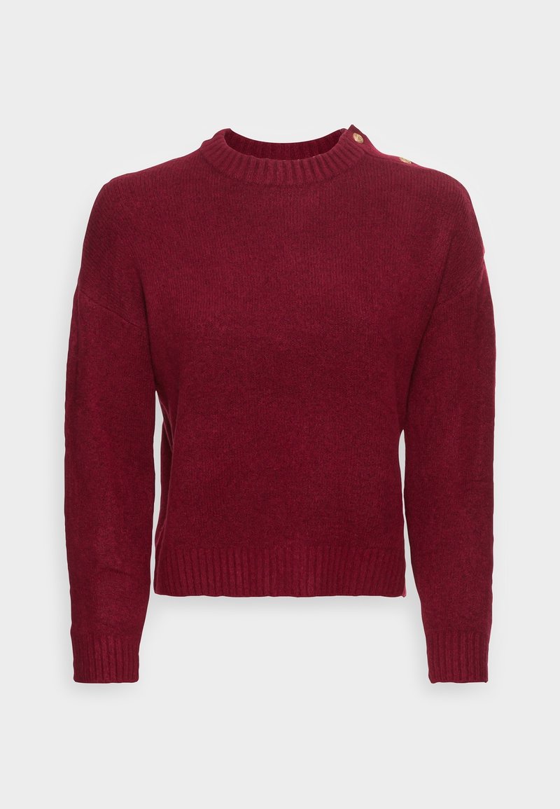 Burgundy sweater with a ribbed neckline and hem, featuring long sleeves and a decorative button detail on the left shoulder. Soft texture.