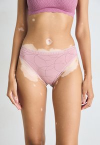Pink panties with a geometric pattern and lace trim. Made from soft fabric, offering full coverage and a smooth fit.