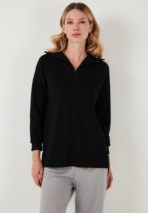 - Bluza