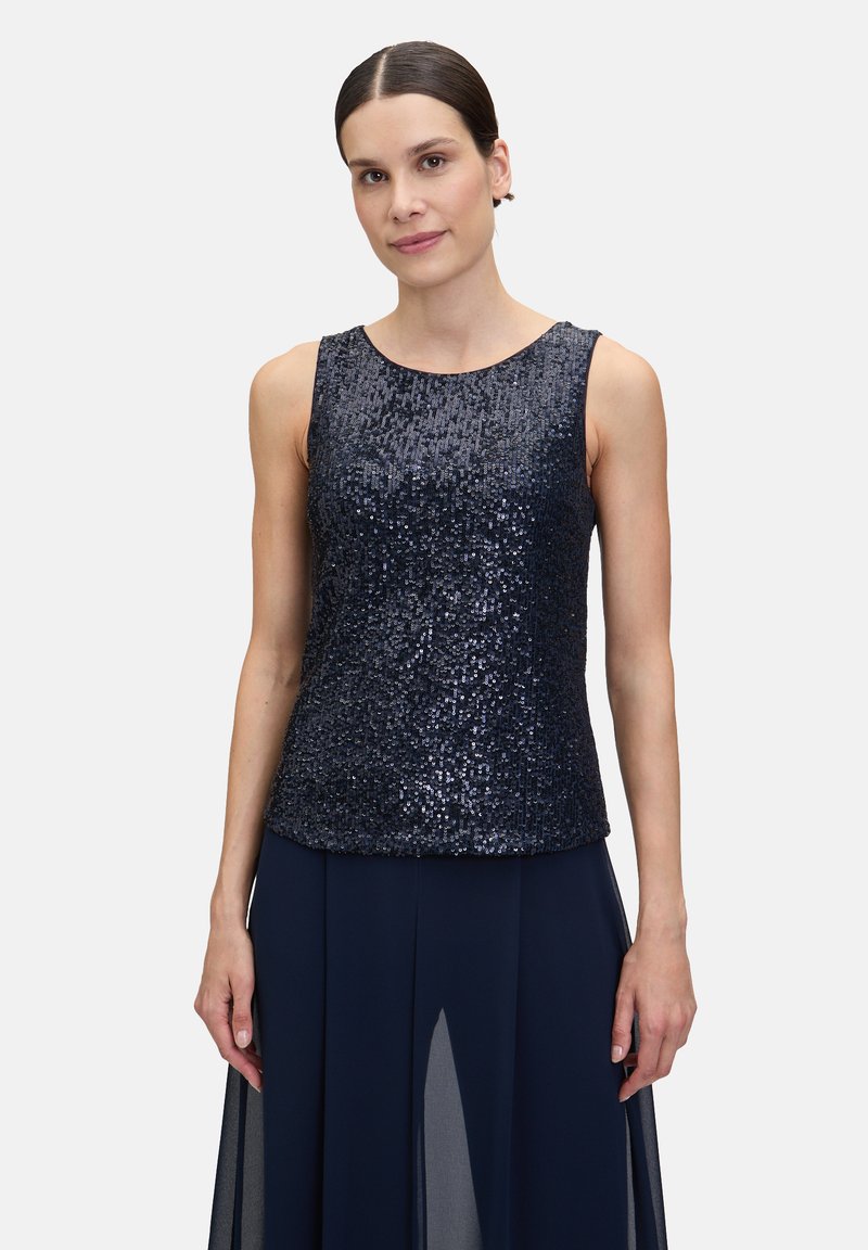 Top sans manches de couleur bleu foncé avec un design texturé de sequins, décolleté arrondi et coupe décontractée. Fond blanc uni.