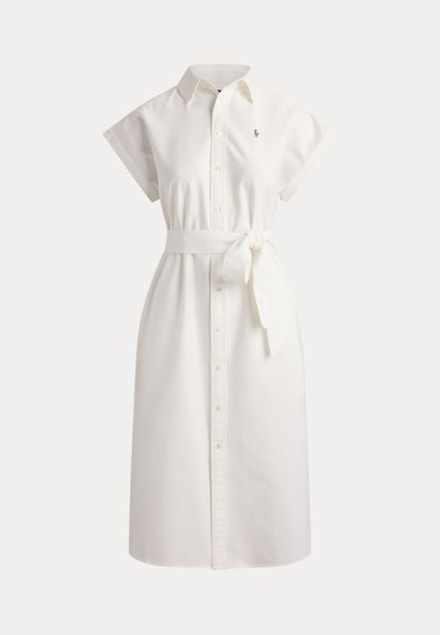 White short-sleeve midi shirt dress with collar, front buttons, a tied waist belt, and small embroidered logo on the chest.