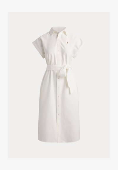 White short-sleeve midi shirt dress with collar, front buttons, a tied waist belt, and small embroidered logo on the chest.