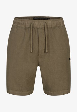 Olijf groene shorts met een elastische tailleband en trekkoord, gemaakt van lichtgewicht materiaal. Beschikt over een kleine logo-accent aan de zijkant.