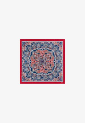 Patterned silk scarf featuring a central red and blue paisley design, bordered by intricate floral motifs and a solid red edge.