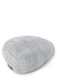 Kussen met ruitenpatroon in lichtblauwe en beige tinten, gemaakt van een zachte, textuurlijke stof en heeft een ronde vorm met een gestikte naaddetail.