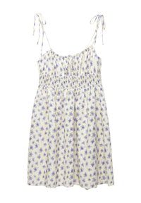 Abito estivo floreale di crema con fiori viola. Spalline regolabili con nodo, corpetto smock elastico e gonna fluida. Tessuto leggero.