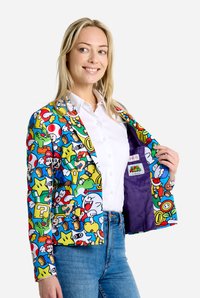 Colorful blazer featuring a Super Mario-themed print with iconic characters on a blue background; purple interior lining with tag.
