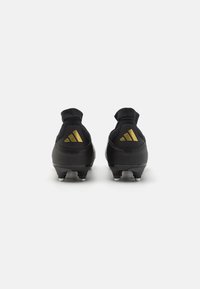 adidas Performance F50 LEAGUE MID SG - Botas de fútbol para terrenos blandos - core black/iron metallic/gold metallic
