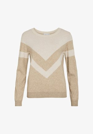 Pull beige et écru à manches longues avec col rond et motif en chevrons sur la poitrine et les manches.