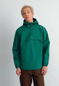 Carhartt WIP Jachetă de vânt - chervil/black
