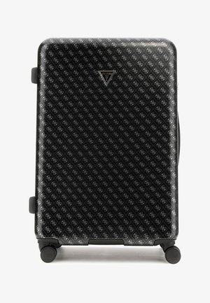 Valise rigide noire avec un motif en logo blanc répété, comportant un logo triangulaire proéminent, quatre roues et une poignée latérale.