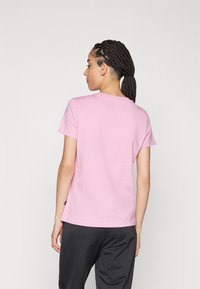 Puma ANIMAL TEE - Camiseta estampada - mauved out