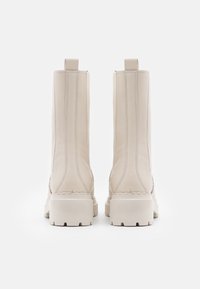 Nubikk Botas con plataforma - beige