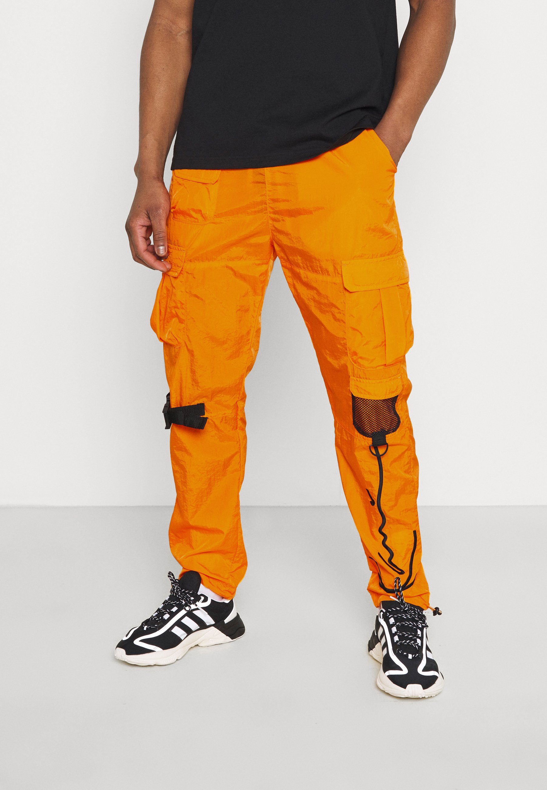 Karl Kani SIGNATURE CRINCLE PANTS UNISEX - Cargobroek - orange/Oranje -  Zalando.be