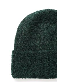 Dark green knit beanie with a textured, fuzzy appearance; features a folded cuff,  full coverage design, and soft wool material.