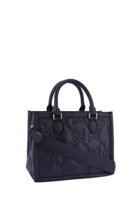 Laukkua, jossa on tummansininen tikattu pinta, kaksinkertaiset yläkahvat ja irrotettava olkahihna. Koristeltu hienovaraisilla kukkakuvioilla ja kultaisella tekniikalla.