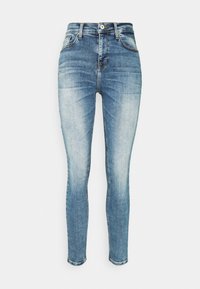 Smala jeans i ljusblå denim med en lätt sliten finish, fem fickor och en traditionell femknappsfly.