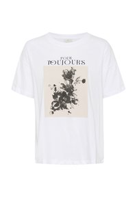 T-shirt en coton blanc avec un imprimé graphique central de fleurs noires sur un fond beige, avec le texte "POUR TOUJOURS" dans une police stylisée.