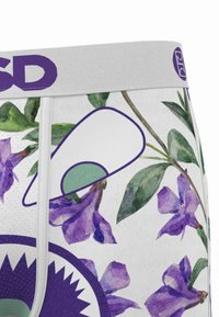 Boxers con un estampado floral púrpura sobre tela blanca, con una cinturilla gris claro con logo. Material texturizado y colores vibrantes.