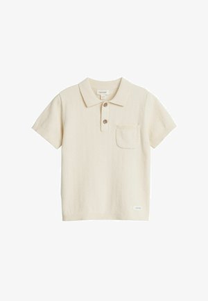 Kortærmet beige polo shirt lavet af tekstureret strikstof, med krave, tre-knapps placket og en lille brystlomme.