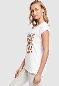 ABSOLUTE CULT TOM AND JERRY - MANY FACES - T-shirts med print - white