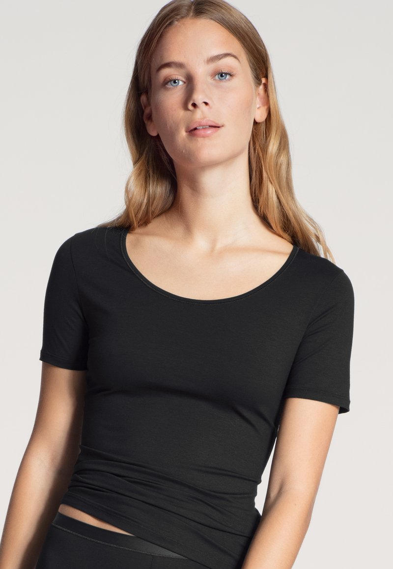 Calida - T-Shirt basic - schwarz, Vergrößern