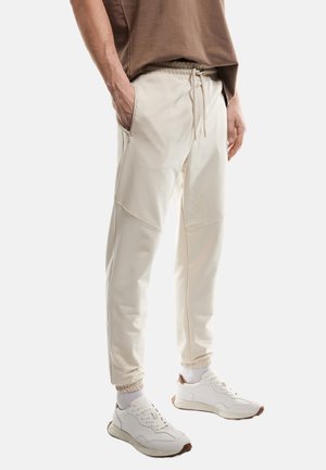 Pantalones deportivos - beige
