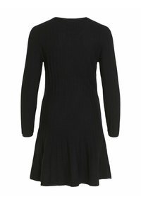 Abito nero a maglia a coste con maniche lunghe e gonna a ruota, mostrato da dietro.