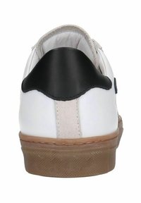 White sneaker featuring a black heel cap and taupe suede accent at the back, with a textured rubber sole and stitched detailing.